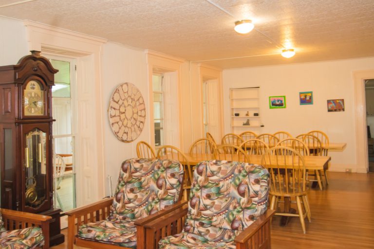 The combined living and dining area at a long-term residential care facility